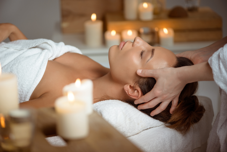 Woman having a relaxing face massage