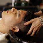 Man relaxing during a head spa hair wash