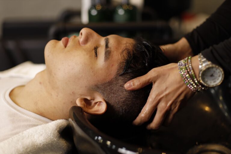 Man relaxing during a head spa hair wash